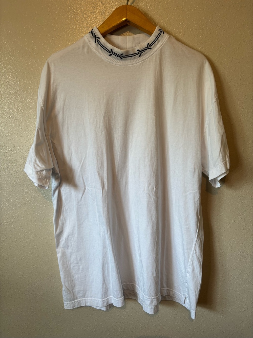 Urban outfitters barbed wire neck tee